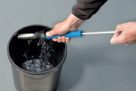 BDS PowerWORKER releasing swarf into a bin